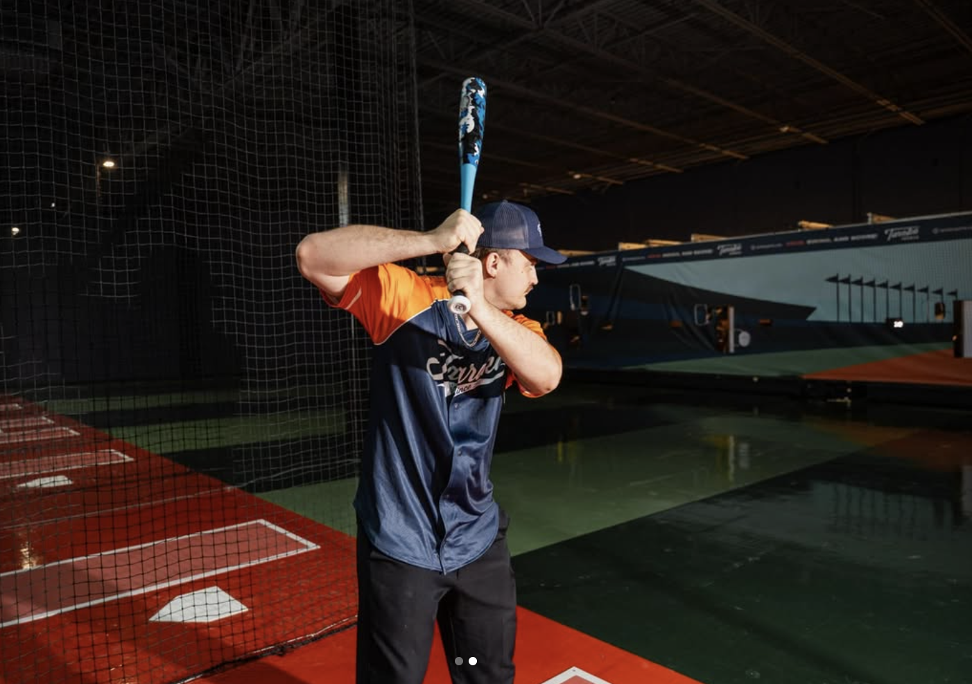 Adult taking batting practice at Taroko Sports